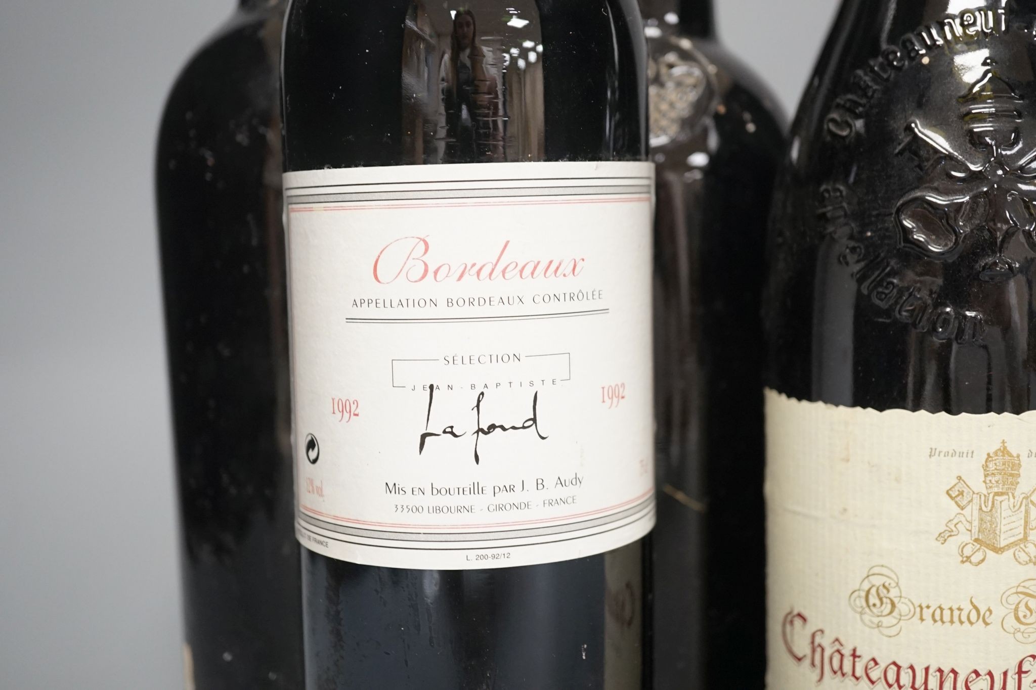 A bottle of Warres 1963 Vintage Port, a bottle of Fonsecca, 1977 Vintage Port and three bottles of wine